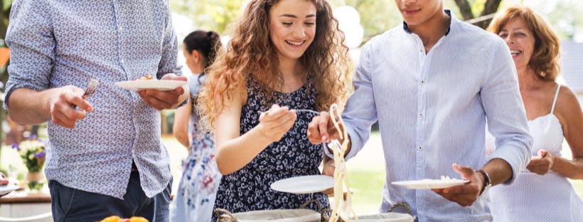 Serving food from a buffet table