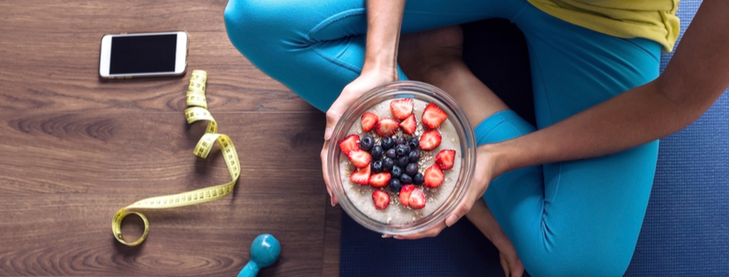 Holding a bowl of healthy breakfast