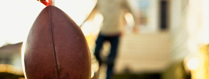 Playing football in the backyard