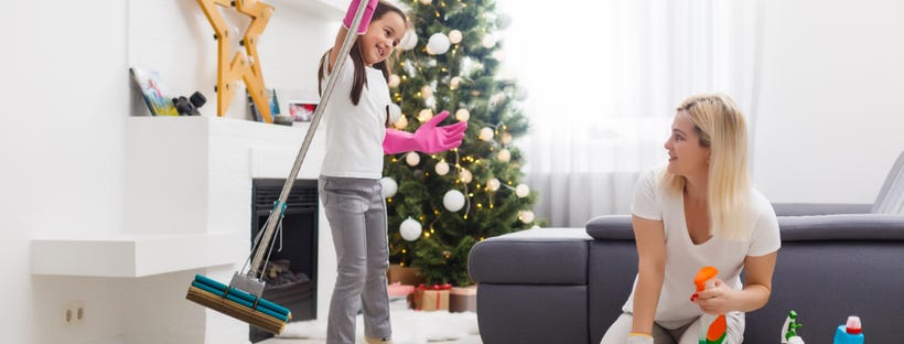 Mother and Daugther doing post Christmas cleaning 