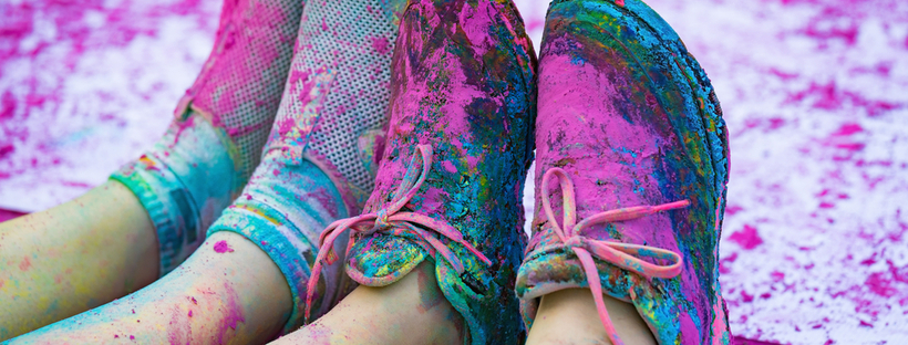Colorful shoes with pink colored powder